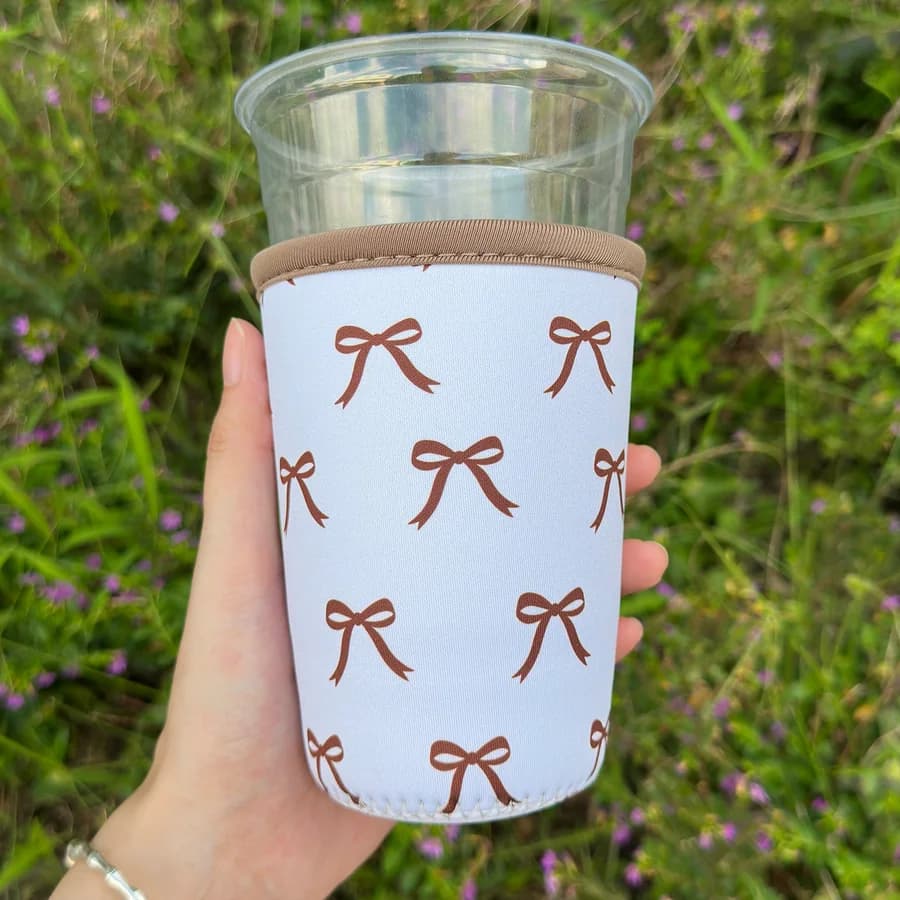 Bow print neoprene coffee sleeve with a closed bottom