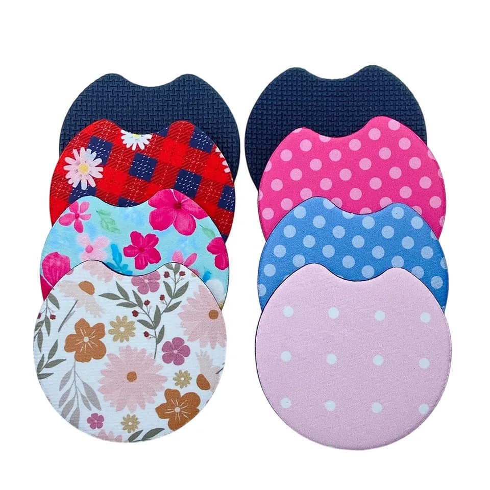 Round printed car coasters with finger notches in several patterns