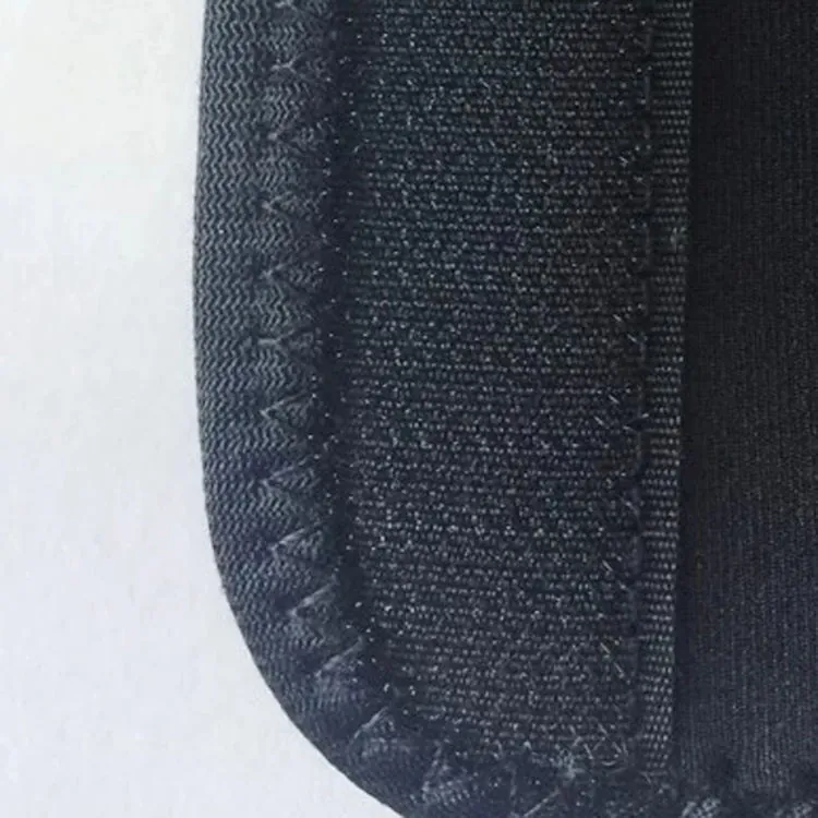 Close-up of the hook-and-loop fastener and stitched binding