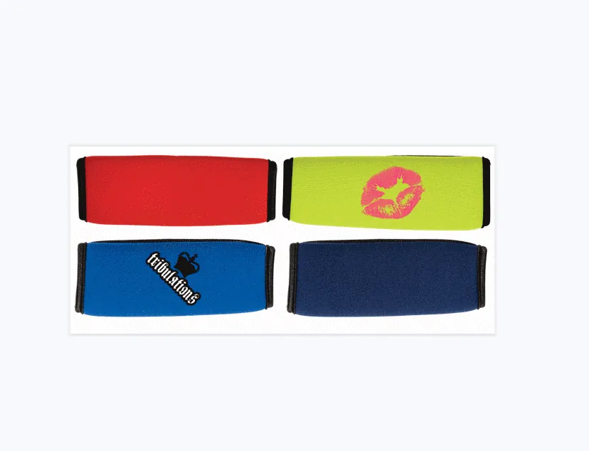 Four luggage wraps showing plain colors and example printed artwork