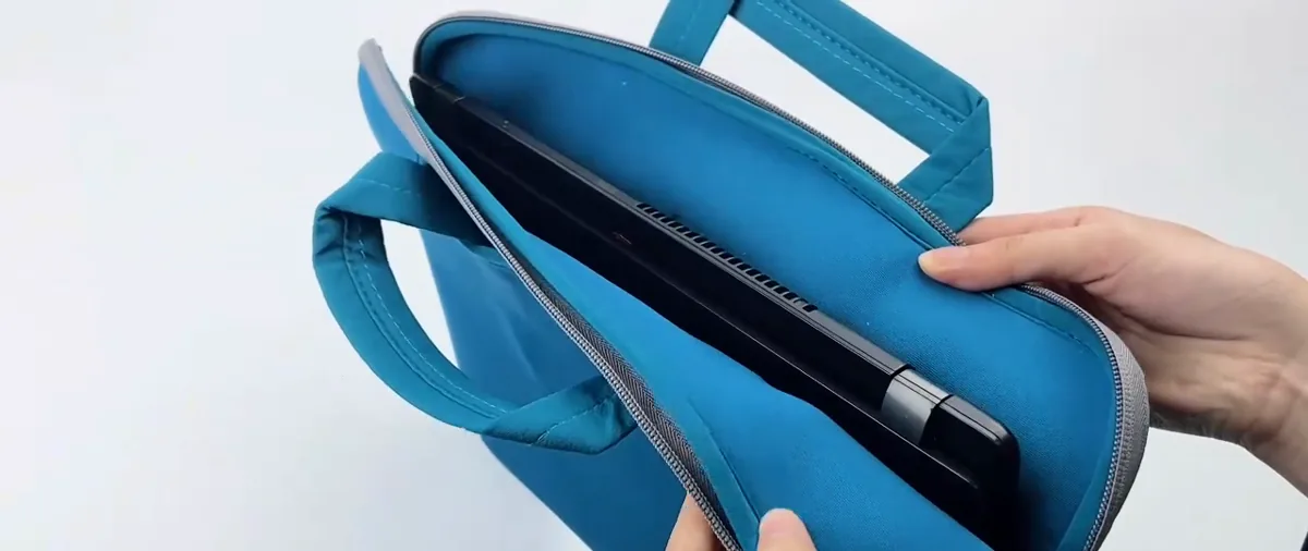 Still from the demonstration showing the open laptop compartment