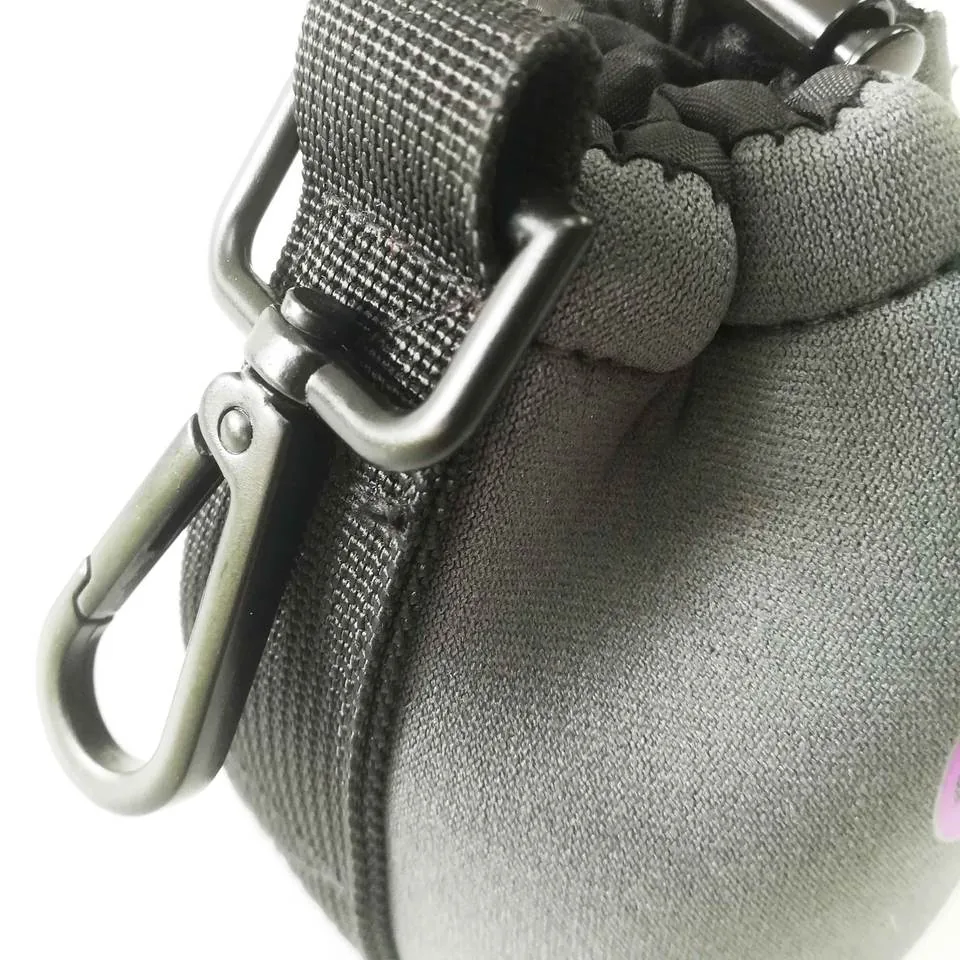 Side clip, ring and webbing attachment on the lens pouch