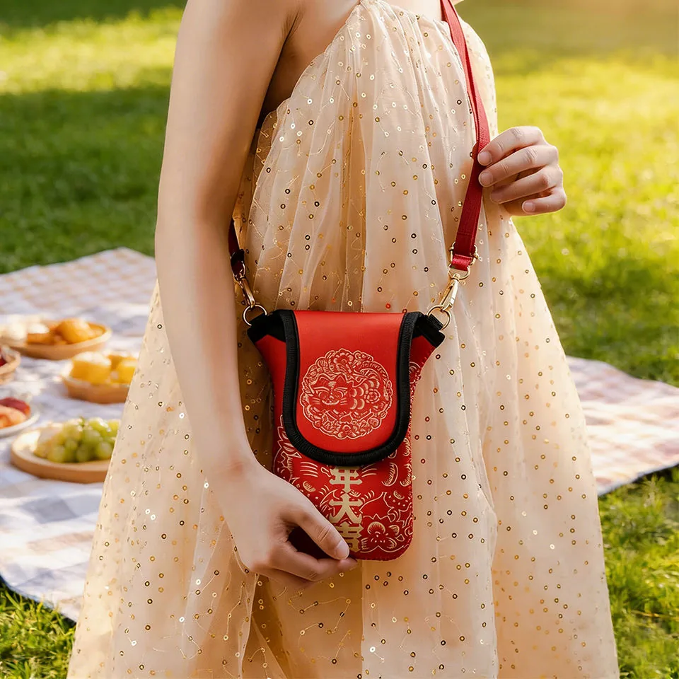 Wearing illustration of the red phone pouch with shoulder strap