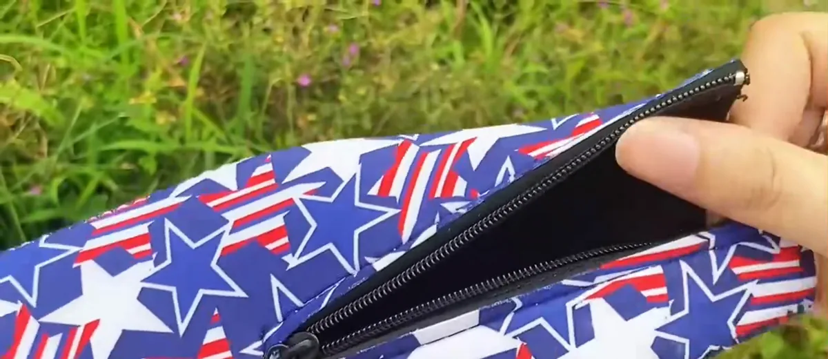 Actual video still showing the zipper opening and black interior