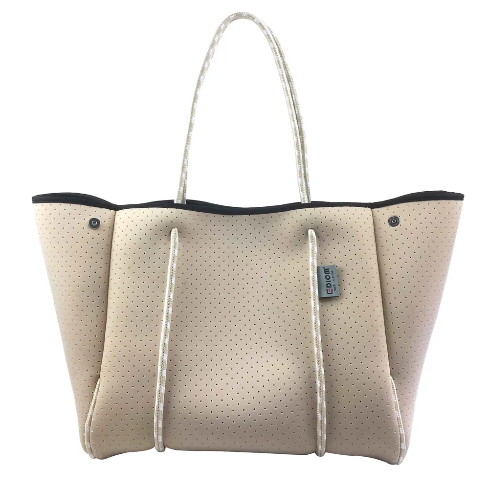 The same tote with side snaps opened to show its wider top