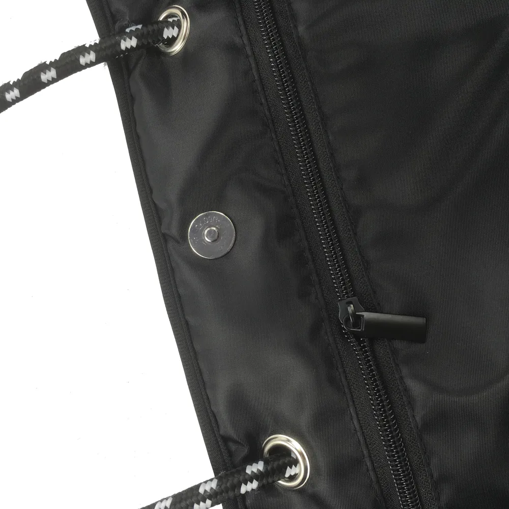 Close-up of the tote interior zipper, snap and handle attachment
