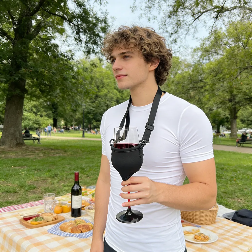 Outdoor illustration of an adult wearing the wine glass holder